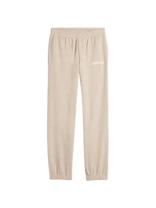 자크뮈스 르 조깅 자크뮈스 로고 프린티드 트랙 팬츠 라이트 베이지 Jacquemus Le Jogging Jacquemus Logo Printed Track Pants Light Beige