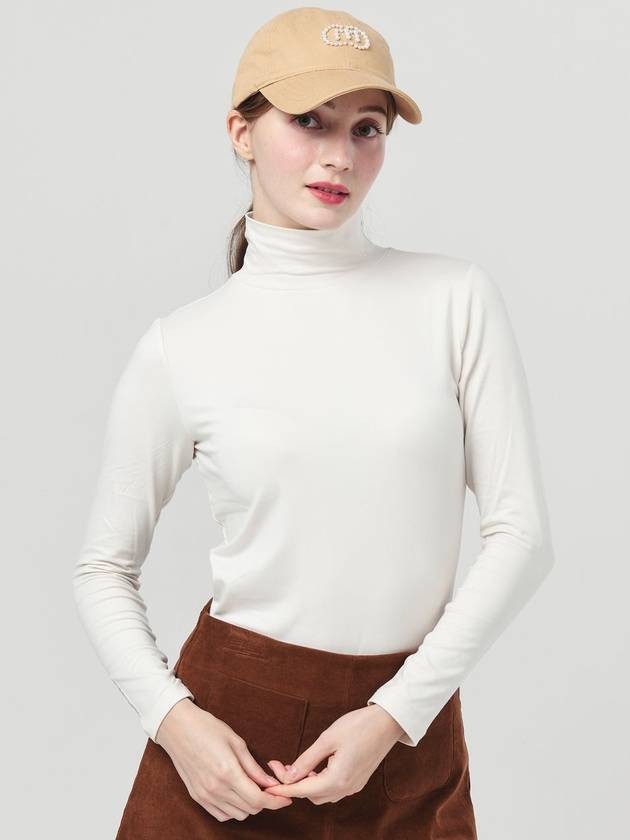 23FW 두유노우엠씨 여성 기능성 웜 스판 모크 넥 크림 베이지 티셔츠 DO5232TS02-1