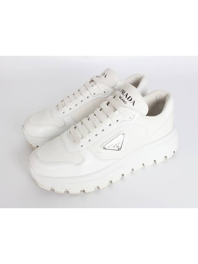 프라다 삼각로고 레터 스니커즈 37 240
