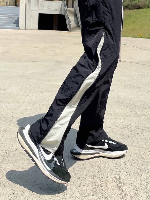 클라코 나일론 사이드 라인 지퍼 팬츠 블랙 크림