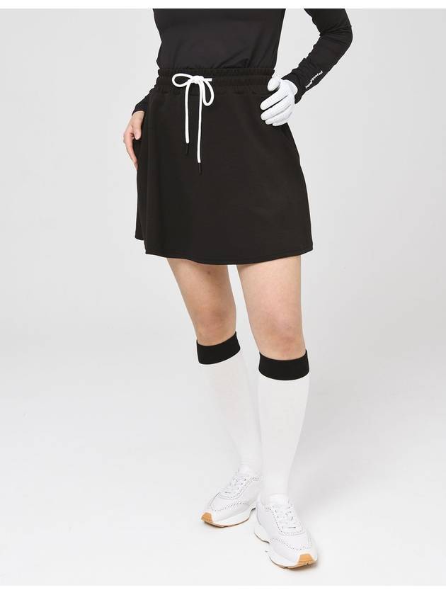 25SS 두유노우엠씨 여성 허리 전체 밴딩 4부 져지 블랙 스커트 DO3252SK002