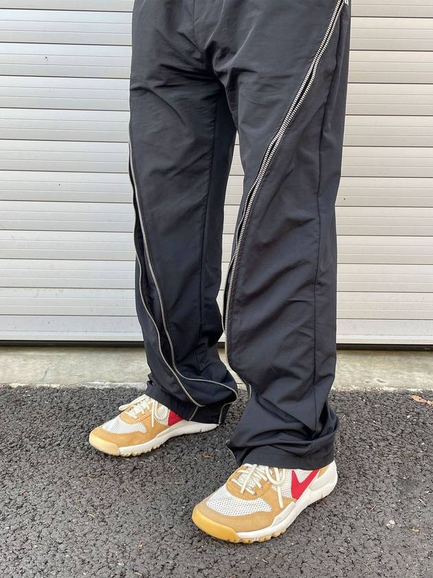 클라코 오블리크 지퍼 팬츠 블랙